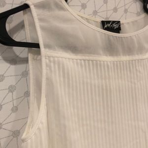 Ivory shell with draped folding